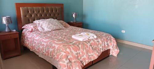 Postel nebo postele na pokoji v ubytování BUENDIA HOTEL