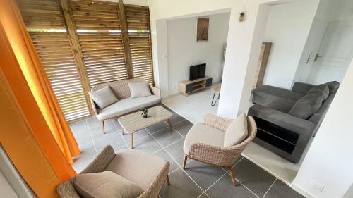 Posezení v ubytování LE MANGO 'Lodge