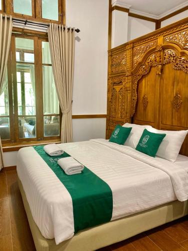 Postel nebo postele na pokoji v ubytování Sampai Villa Antapura