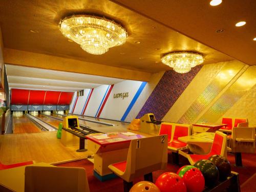 a bowling alley with pins and a bowling ball at Mikazuki Sea-Park Hotel Katsuura in Katsuura