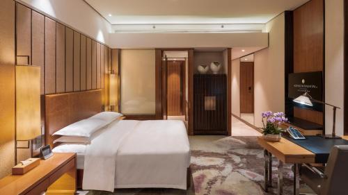 InterContinental Changshaにあるベッド