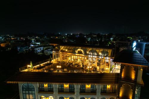 a building at night with lights on it at Clarks Inn Express, Rishikesh in Rishīkesh