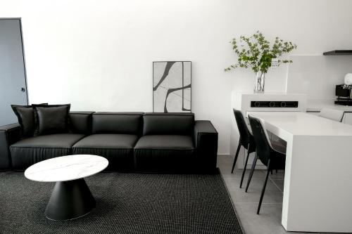 Χώρος καθιστικού στο Langkawi Homestay at Simfoni Beliza Apartment by Chien