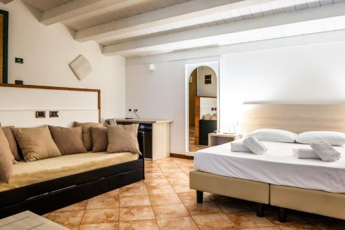Postel nebo postele na pokoji v ubytování B&B Hotel Roy