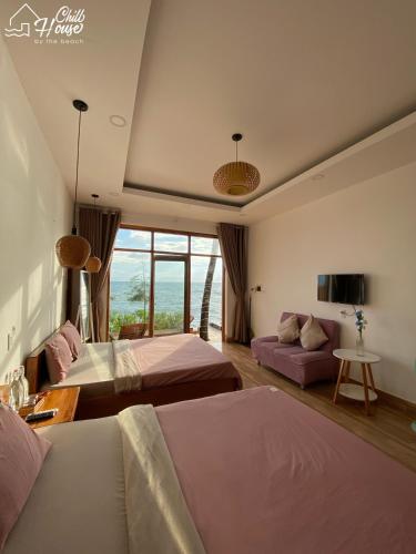 Кровать или кровати в номере CHILL HOUSE by the beach