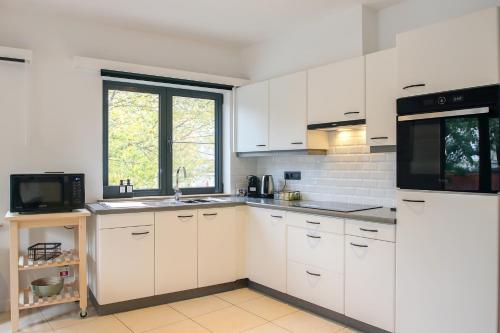 Köök või kööginurk majutusasutuses Charmant Gents app met alle comfort en vlot bereikbaar
