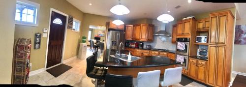 a kitchen with a island in the middle of it at Waterfront vacation home in Kingsville