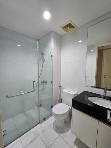 A bathroom at St Moritz Apartment Puri Indah