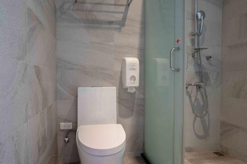 Un baño de CHECK inn Taichung Ziyou