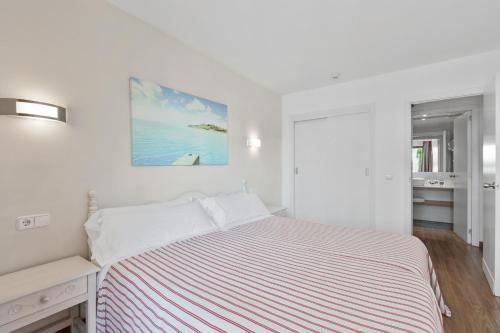 Postel nebo postele na pokoji v ubytování Apartamentos Pabisa Orlando