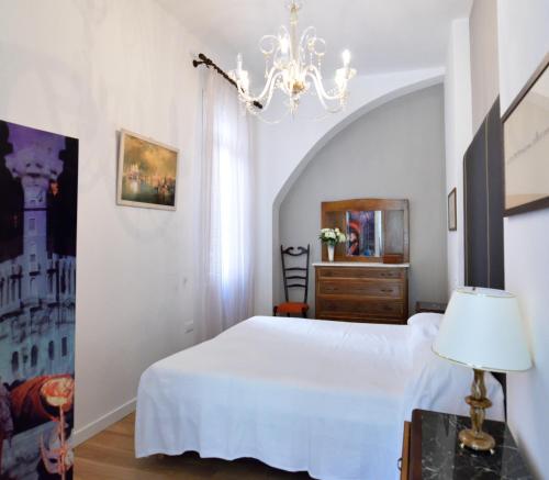 Llit o llits en una habitació de San Giacomo Apartment
