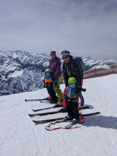 a group of people standing on skis in the snow at Ferienwohnung Mathias Kennerknecht in Fischen