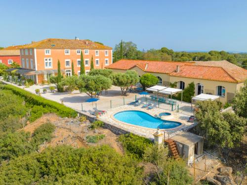 an aerial view of a resort with a swimming pool at LES FLAMANTS in Portiragnes