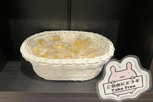 a basket of food with a sign next to it at Coral Gate in Kume コーラルゲートイン久米 in Naha