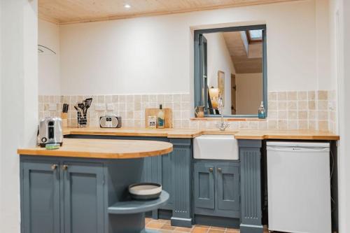 Köök või kööginurk majutusasutuses Lapwing Cottage