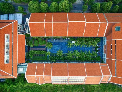 Tenis a/nebo squash v ubytování Almanity Hoi An Resort & Spa nebo okolí