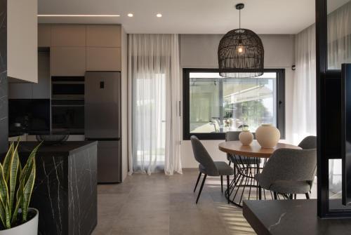 Η κουζίνα ή μικρή κουζίνα στο Estellar Villas, 50meters from the Sea
