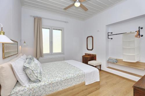 Postel nebo postele na pokoji v ubytování Villa Kamara