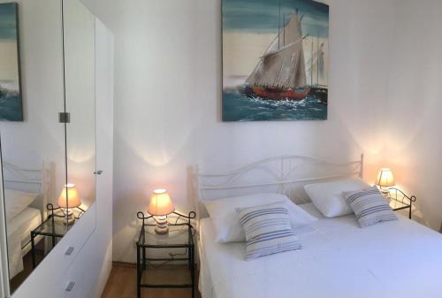 Ένα ή περισσότερα κρεβάτια σε δωμάτιο στο Apartments Eastern Paradise
