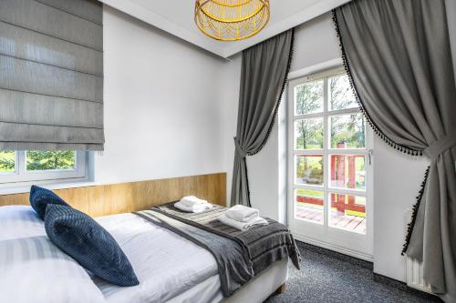 Llit o llits en una habitació de Bukowina Tatrzańska- apartament Dudek z widokiem na Tatry