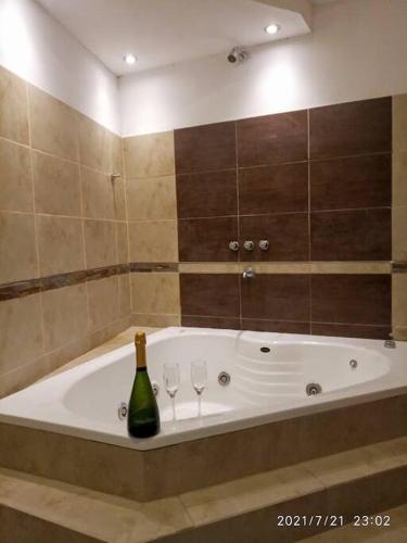 Ένα μπάνιο στο Dto EXCLUSIVO ZONA PARQUE CON JACUZZI 2 Dorm