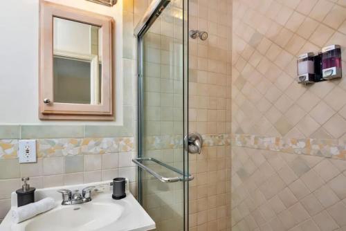 a bathroom with a sink and a shower at Intracoastal view Family Getaway Downtown in Hollywood
