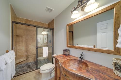 a bathroom with a sink and a toilet and a shower at Cabin with Mountain Views Near Cashiers and Highlands in Sapphire