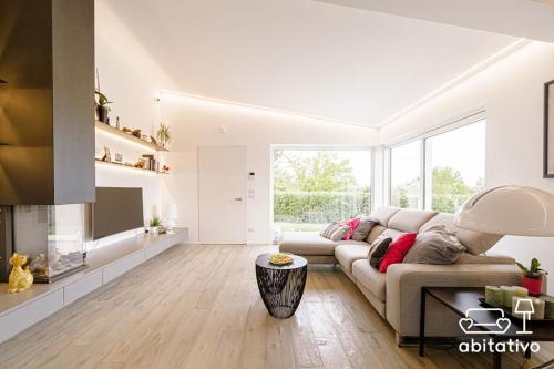 a living room with a couch and a fireplace at Grimaldi House 64 in Rome