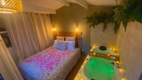 Postelja oz. postelje v sobi nastanitve L'annexe spa du Tropical Lodge