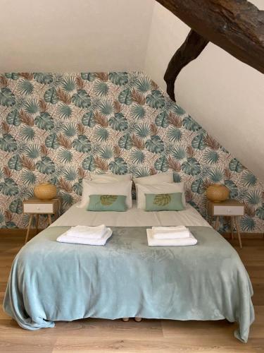 Postel nebo postele na pokoji v ubytování La Charmeraie : gîte de charme, piscine et spa