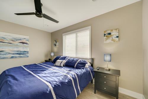 a bedroom with a bed and a ceiling fan at Updated Algonac Home - Walk to St Clair River! in Algonac