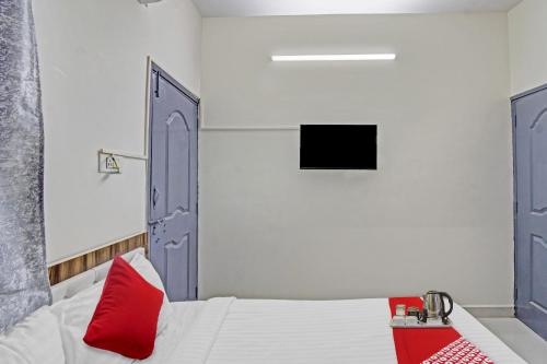 Katil atau katil-katil dalam bilik di Hotel O Pritesh Grand