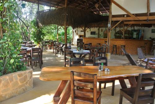 ห้องอาหารหรือที่รับประทานอาหารของ Mundo Milo Eco Lodge