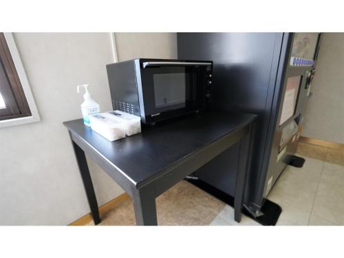 Кухня или мини-кухня в Hotel Area One Oita - Vacation STAY 99724v
