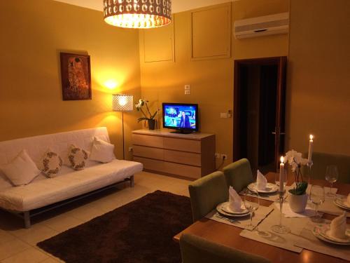 Televisyen dan/atau pusat hiburan di Holiday Dreams