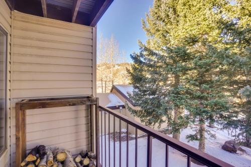 a balcony of a house with a tree at Walkable Brian Head Condo Steps to Ski Resort! in Brian Head