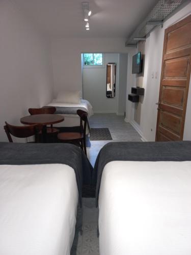 Un ou plusieurs lits dans un hébergement de l'établissement Hotel Cocó Cochoa