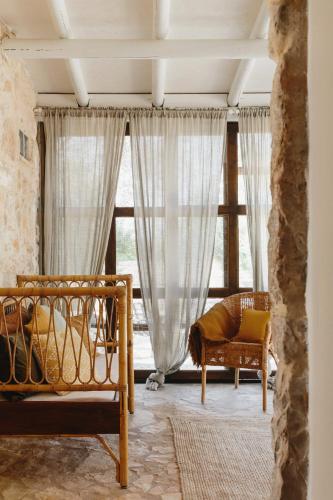 a bedroom with two beds and a window at Casa Brava - Algarve in Loulé