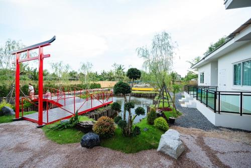 Jardín al aire libre en Yunoya Riverside Villa