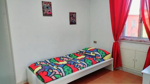 Posteľ alebo postele v izbe v ubytovaní LG HOUSE casa vacanze