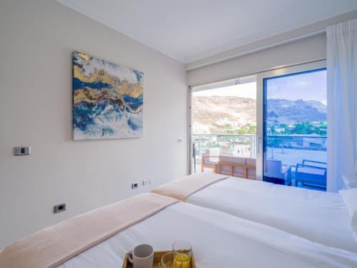 Postel nebo postele na pokoji v ubytování Amarre Coral