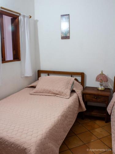 Postel nebo postele na pokoji v ubytování Apartamento Lula