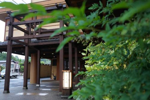 a building with a light in front of it at Dantokan Kikunoya in Otsu