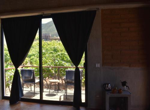 Un balcón o terraza de UvaUva eco-retreat