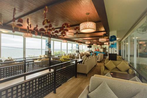 a restaurant with a view of the ocean at Seaside Resort Vung Tau in Vung Tau