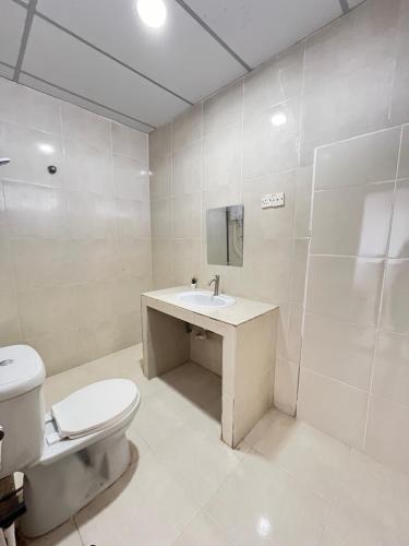 Koupelna v ubytování IBAI BEACH GUESTHOUSE