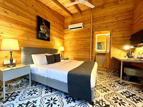 Postel nebo postele na pokoji v ubytování Bedrock Boutique Hostel