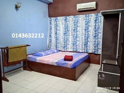 Postel nebo postele na pokoji v ubytování Ekaira homestay