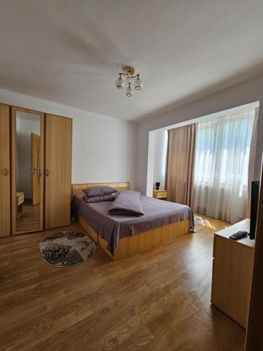 Llit o llits en una habitació de Studio Bulevardul Victoriei