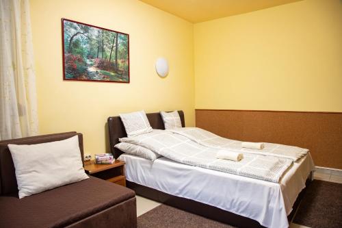Katil atau katil-katil dalam bilik di Erika Apartmanház